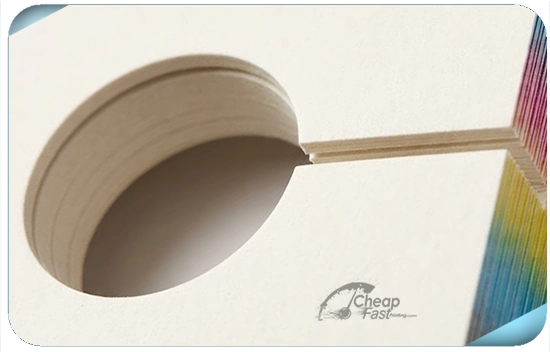 Close up of die-cut hole quality on 16pt premium cardstock door hangers