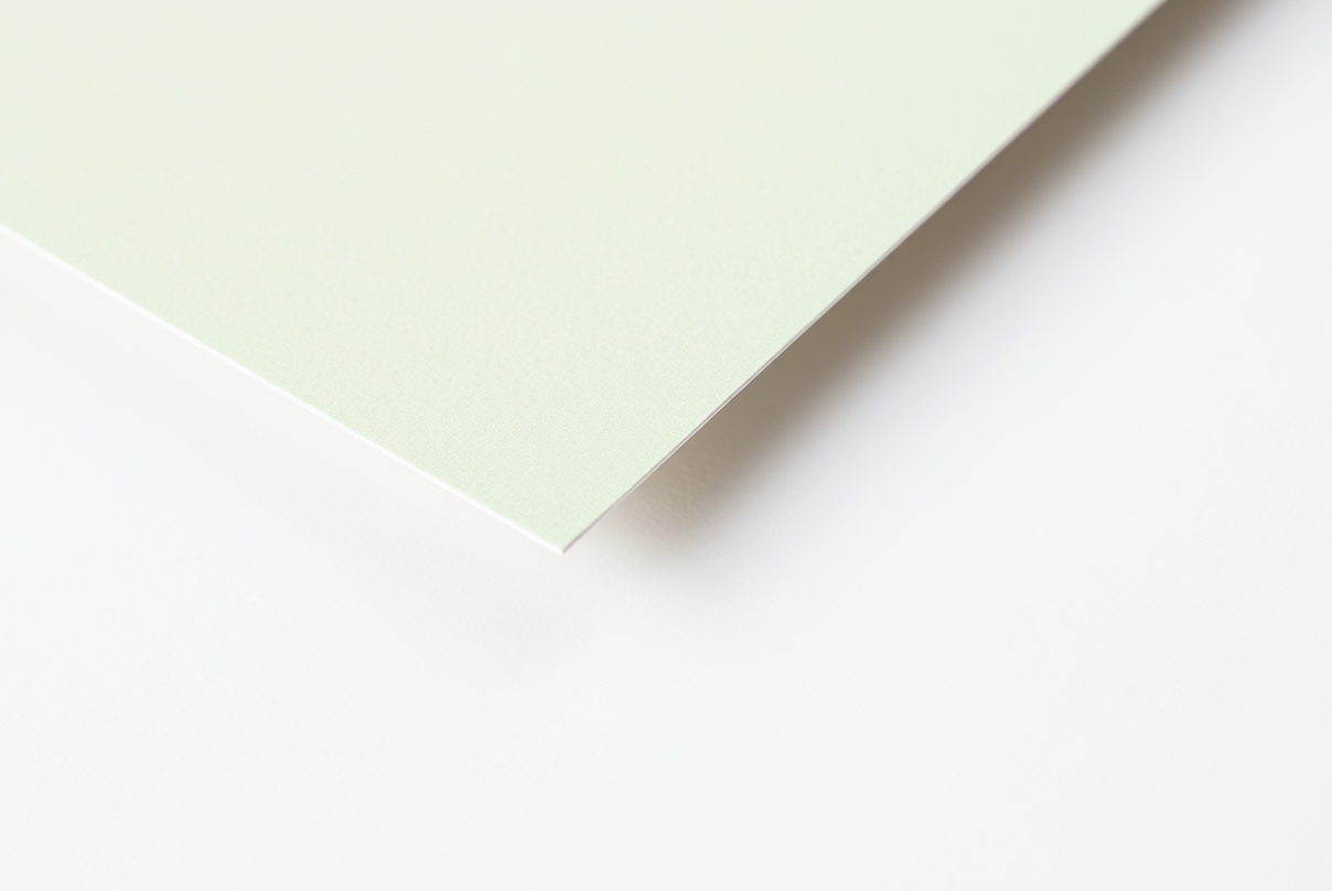 Soft Touch Ready Postcard Stock Explained: Feel, Durability, and Campaign Fit: a close-up of postcard corners revealing paper weight and finish.